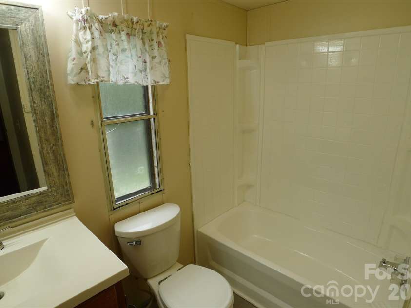 116 Hank Lesser Road, Mocksville, NC 27028.  MLS# CAR4406699, YatesRealty ID 39483. Bathroom