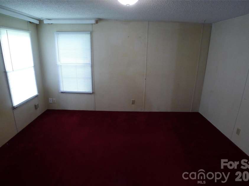 116 Hank Lesser Road, Mocksville, NC 27028.  MLS# CAR4406699, YatesRealty ID 39483. Den