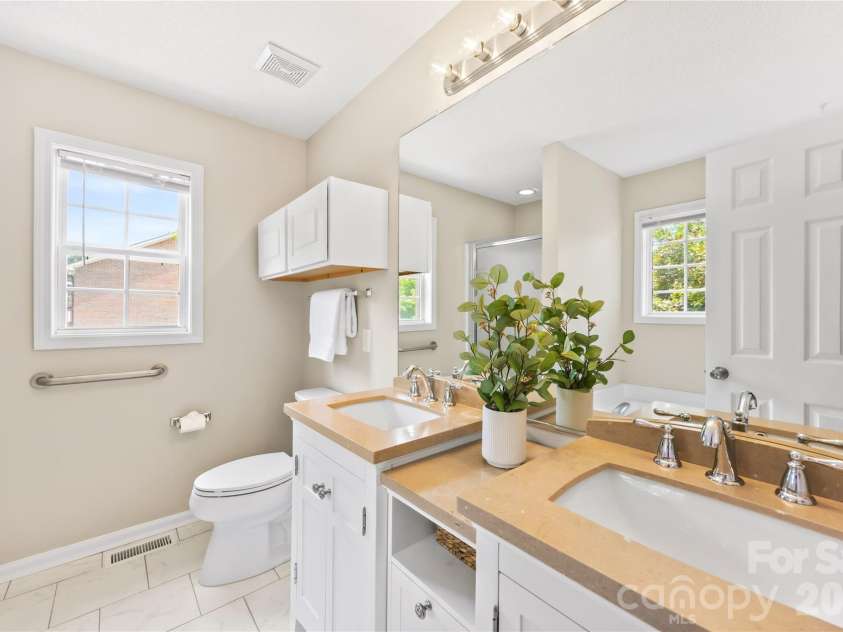 321 Kilmer Lane, Mooresville, NC 28115.  MLS# CAR4405643, YatesRealty ID 39485. Primary bath has two basins!
