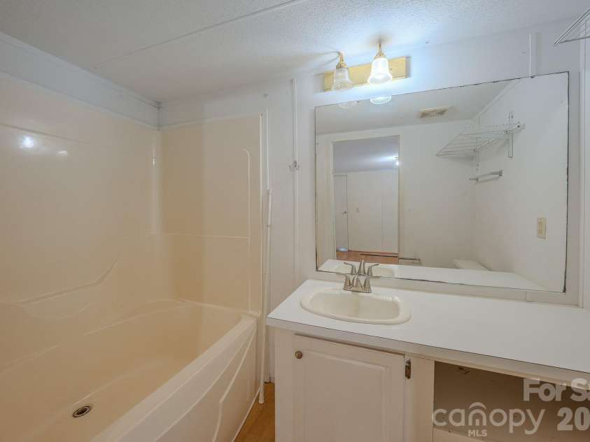 23 Tom Worley Road, Leicester, NC 28748.  MLS# CAR4406985, YatesRealty ID 39486. 