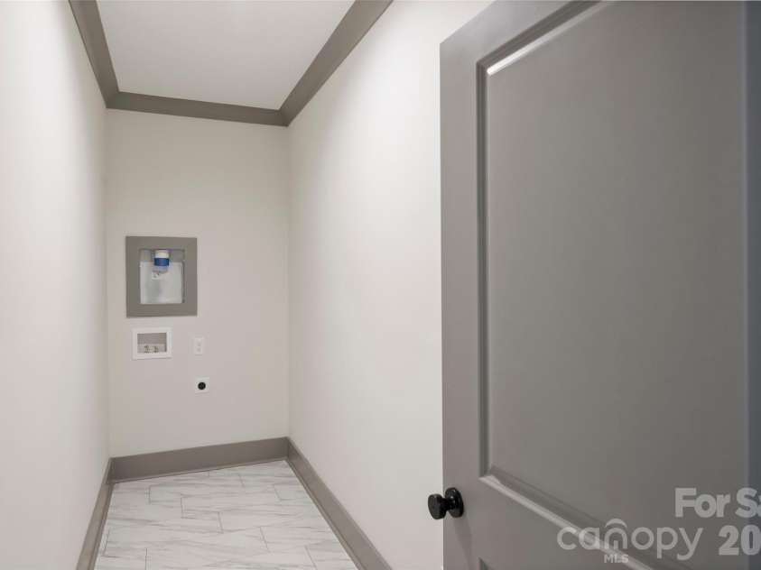 8159 Fairview Road, Charlotte, NC 28226.  MLS# CAR4350673, YatesRealty ID 39491. 2nd Laundry Area - upstairs