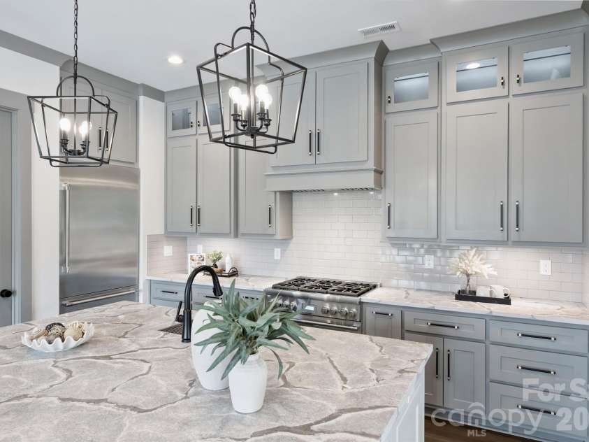 8159 Fairview Road, Charlotte, NC 28226.  MLS# CAR4350673, YatesRealty ID 39491. Beautiful Custom Cabinetry to the Ceiling