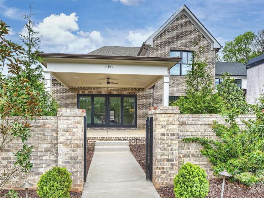 8159 Fairview Road, Charlotte, NC 28226.  MLS# CAR4350673, YatesRealty ID 39491. Gated Access to rear yard