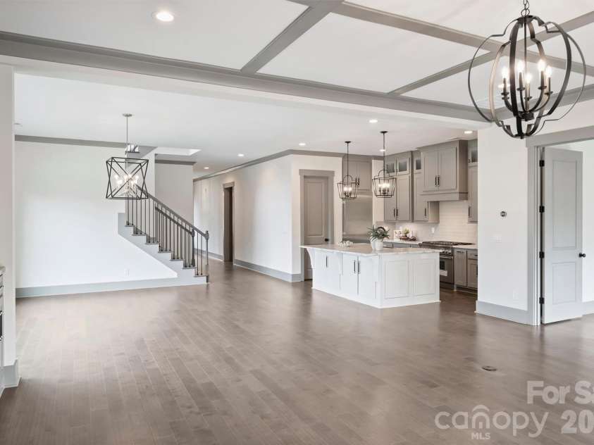 8159 Fairview Road, Charlotte, NC 28226.  MLS# CAR4350673, YatesRealty ID 39491. Great Room view to Dining Area and Kitchen