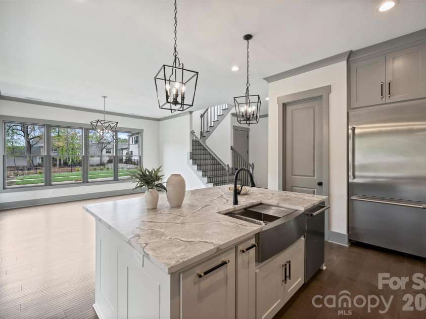 8159 Fairview Road, Charlotte, NC 28226.  MLS# CAR4350673, YatesRealty ID 39491. Kitchen View to Dining area. Pantry and Refrigerator #1