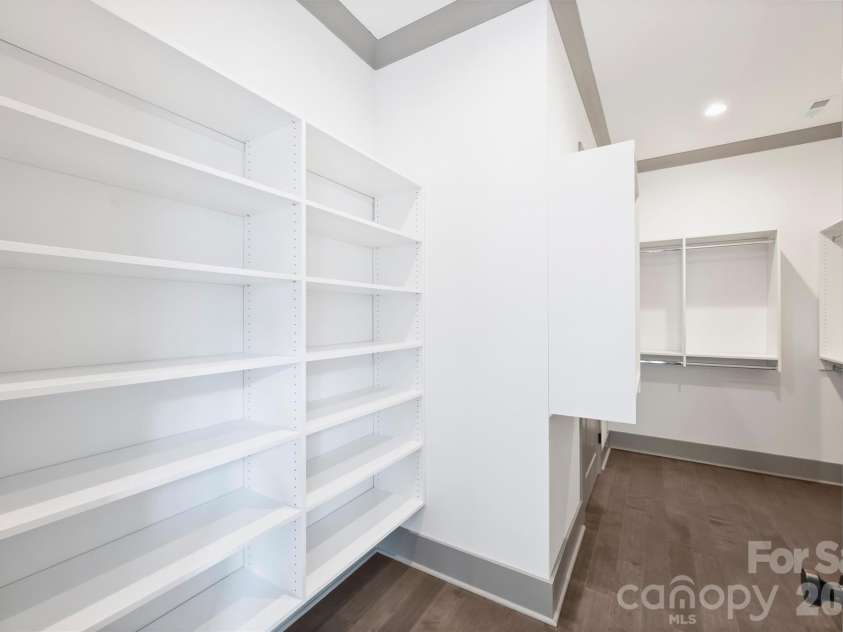 8159 Fairview Road, Charlotte, NC 28226.  MLS# CAR4350673, YatesRealty ID 39491. Primary Closet with Built-in Shelving