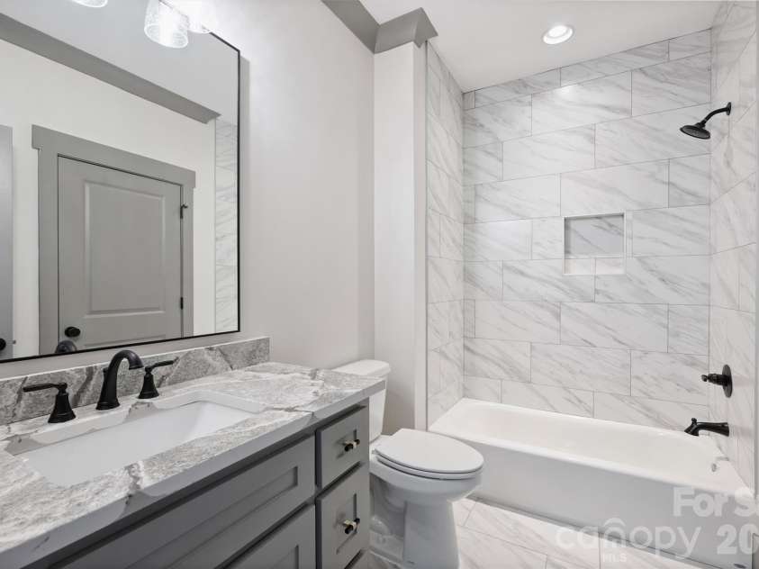 8159 Fairview Road, Charlotte, NC 28226.  MLS# CAR4350673, YatesRealty ID 39491. Upstairs Hall Bathroom