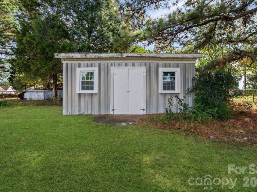 520 Wright Avenue, Kannapolis, NC 28083.  MLS# CAR4406912, YatesRealty ID 39498. Storage shed