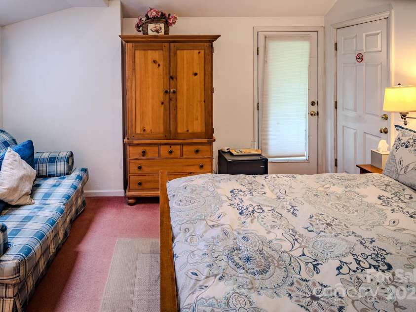 4584 & 4582 NC Highway 194 None, Banner Elk, NC 28604.  MLS# CAR4269014, YatesRealty ID 395. Red Cottage - Guest Suite