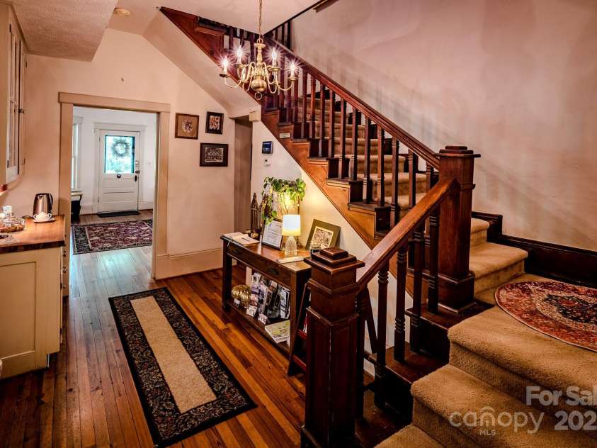 4584 & 4582 NC Highway 194 None, Banner Elk, NC 28604.  MLS# CAR4269014, YatesRealty ID 395. Taylor House Inn - Main Level Vestibule & Stairs to 2nd Level