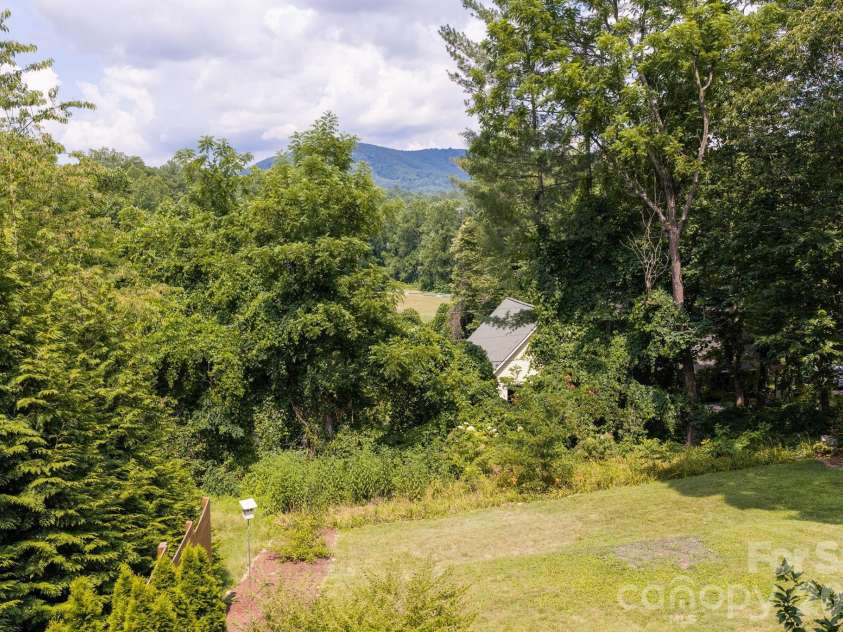 72 Ivanhoe Avenue, Asheville, NC 28806.  MLS# CAR4398114, YatesRealty ID 39504. Overlooking the backyard
