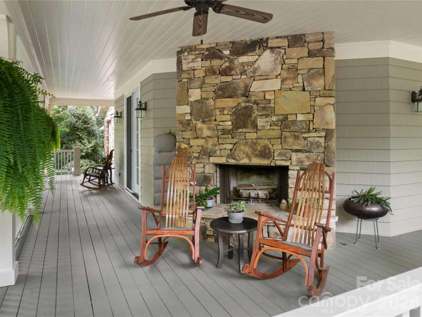 38 Cheshire Drive, Black Mountain, NC 28711.  MLS# CAR4403485, YatesRealty ID 39509. Front porch wood burning fireplace.