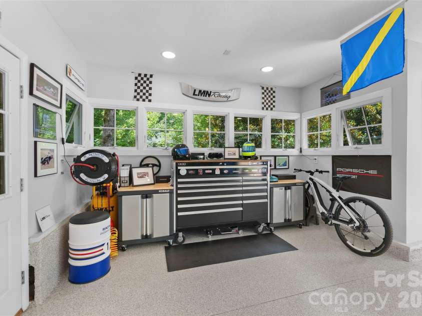 38 Cheshire Drive, Black Mountain, NC 28711.  MLS# CAR4403485, YatesRealty ID 39509. Garage work area