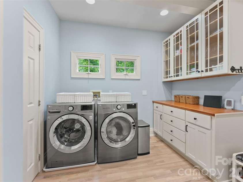 38 Cheshire Drive, Black Mountain, NC 28711.  MLS# CAR4403485, YatesRealty ID 39509. Laundry room