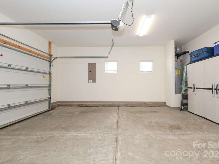 336 Abington Street, Matthews, NC 28104.  MLS# CAR4234511, YatesRealty ID 3953. Spacious finished side by side garage