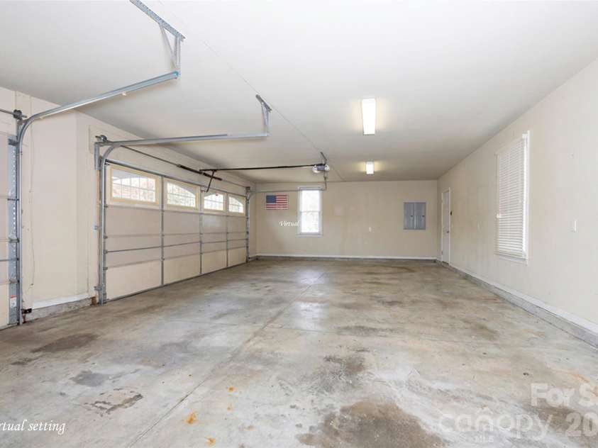 310 James Way, Bermuda Run, NC 27006.  MLS# CAR4406410, YatesRealty ID 39534. Attached Garage with Space for 3 Cars