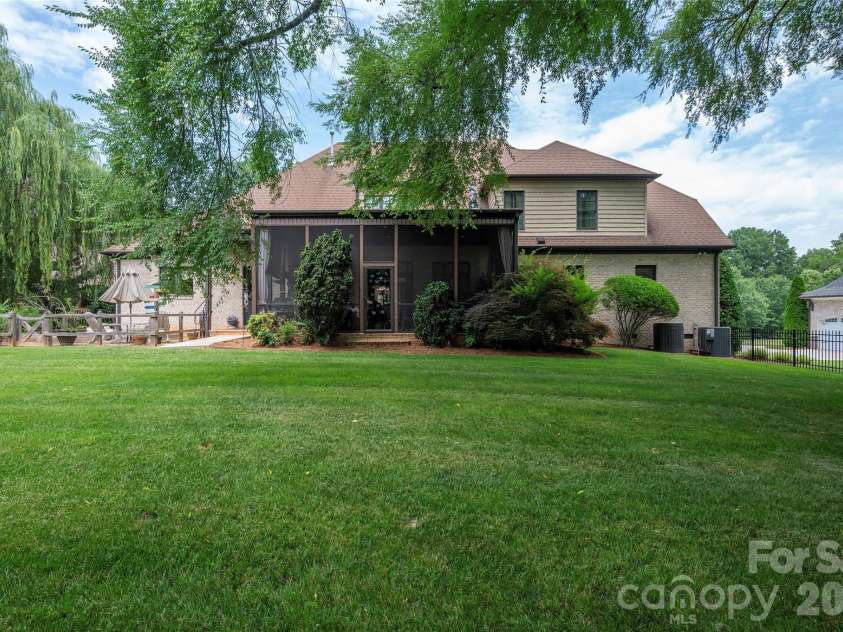310 James Way, Bermuda Run, NC 27006.  MLS# CAR4406410, YatesRealty ID 39534. Large Backyard