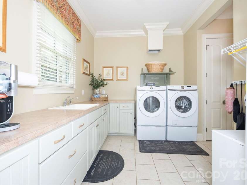 310 James Way, Bermuda Run, NC 27006.  MLS# CAR4406410, YatesRealty ID 39534. Laundry Room