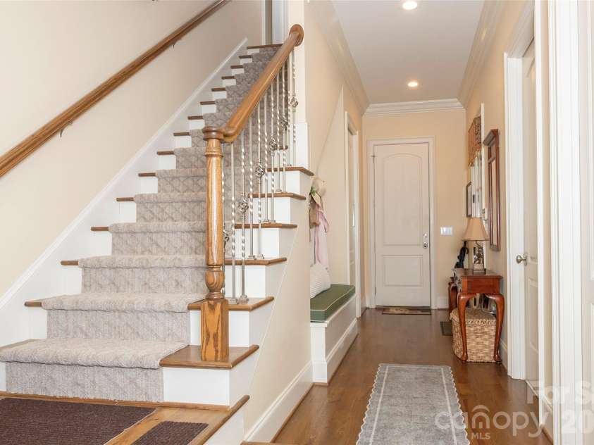 310 James Way, Bermuda Run, NC 27006.  MLS# CAR4406410, YatesRealty ID 39534. Rear Staircase