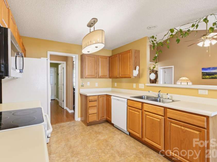 171 Running Briar Road, Fletcher, NC 28732.  MLS# CAR4403856, YatesRealty ID 39536. Kitchen looking from kitchen table area