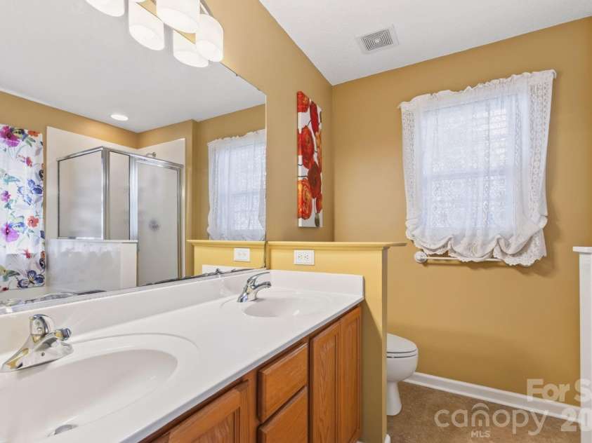 171 Running Briar Road, Fletcher, NC 28732.  MLS# CAR4403856, YatesRealty ID 39536. Primary bathroom double sinks