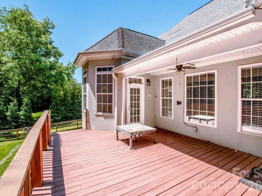 131 Gibbs Road, Mooresville, NC 28117.  MLS# CAR4387694, YatesRealty ID 39537. Large deck for entertaining