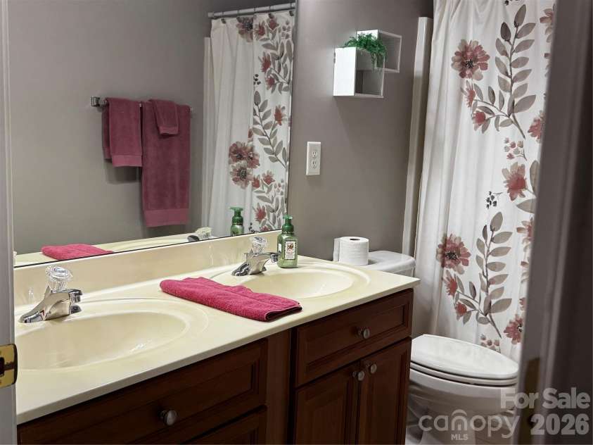 6111 Maple Leaf Avenue, Harrisburg, NC 28075.  MLS# CAR4406897, YatesRealty ID 39548. Hall bath with duel vanities