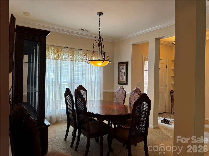 6111 Maple Leaf Avenue, Harrisburg, NC 28075.  MLS# CAR4406897, YatesRealty ID 39548. Large dining room