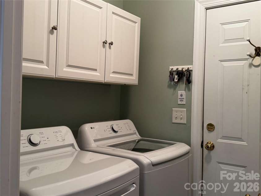 6111 Maple Leaf Avenue, Harrisburg, NC 28075.  MLS# CAR4406897, YatesRealty ID 39548. Laundry room off garage