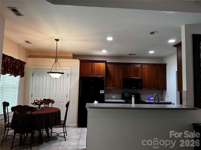 6111 Maple Leaf Avenue, Harrisburg, NC 28075.  MLS# CAR4406897, YatesRealty ID 39548. Opens to great room