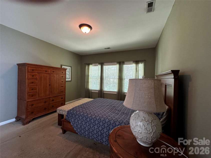 6111 Maple Leaf Avenue, Harrisburg, NC 28075.  MLS# CAR4406897, YatesRealty ID 39548. Primary bedroom