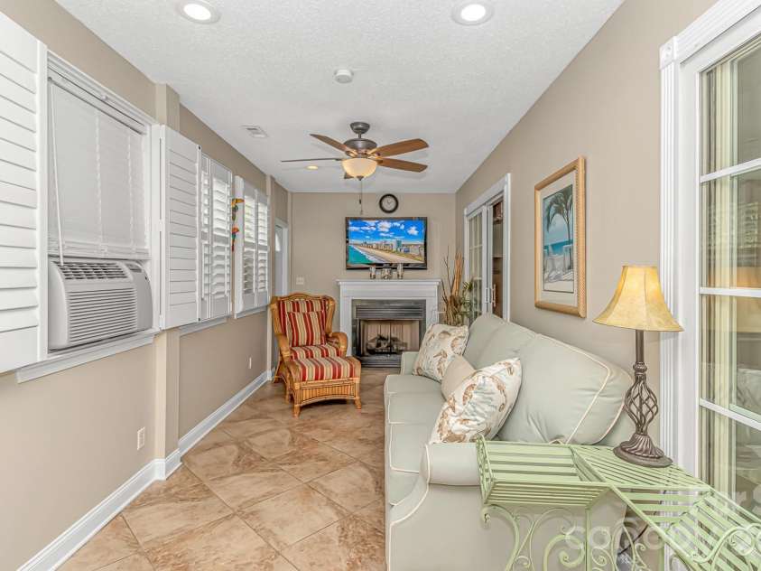 511 21st Avenue, North Myrtle Beach, SC 29582.  MLS# CAR4407127, YatesRealty ID 39556. Back sitting area with wet bar