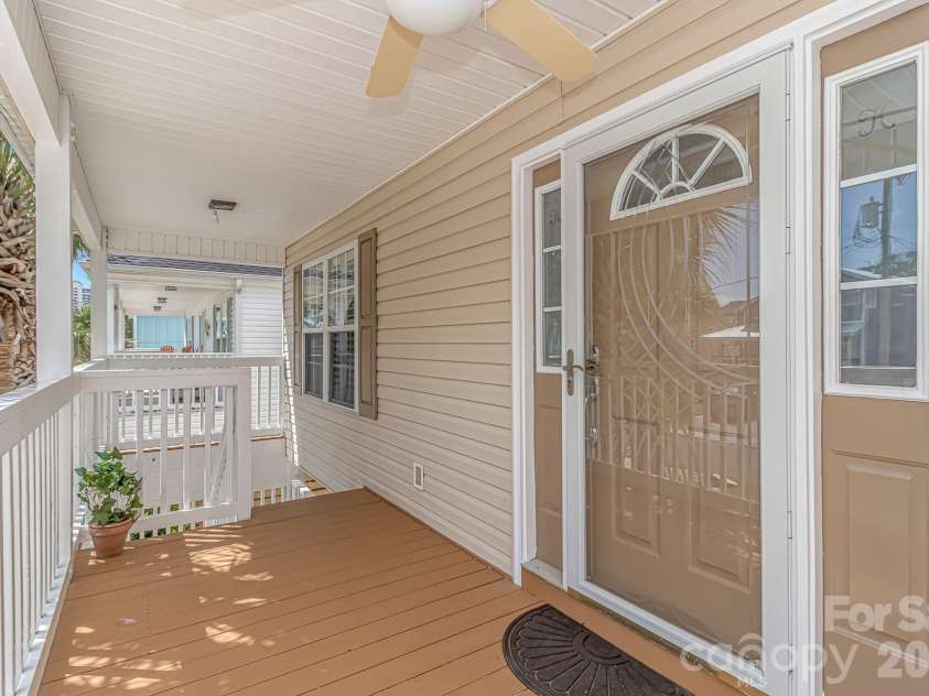 511 21st Avenue, North Myrtle Beach, SC 29582.  MLS# CAR4407127, YatesRealty ID 39556. Front porch