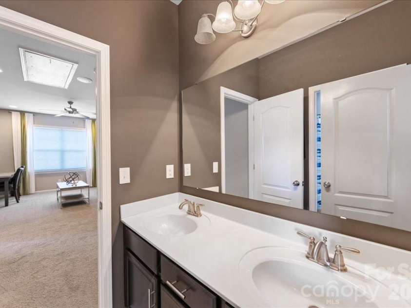 2511 Carnation Drive, Harrisburg, NC 28075.  MLS# CAR4345682, YatesRealty ID 3956. Guest bathroom