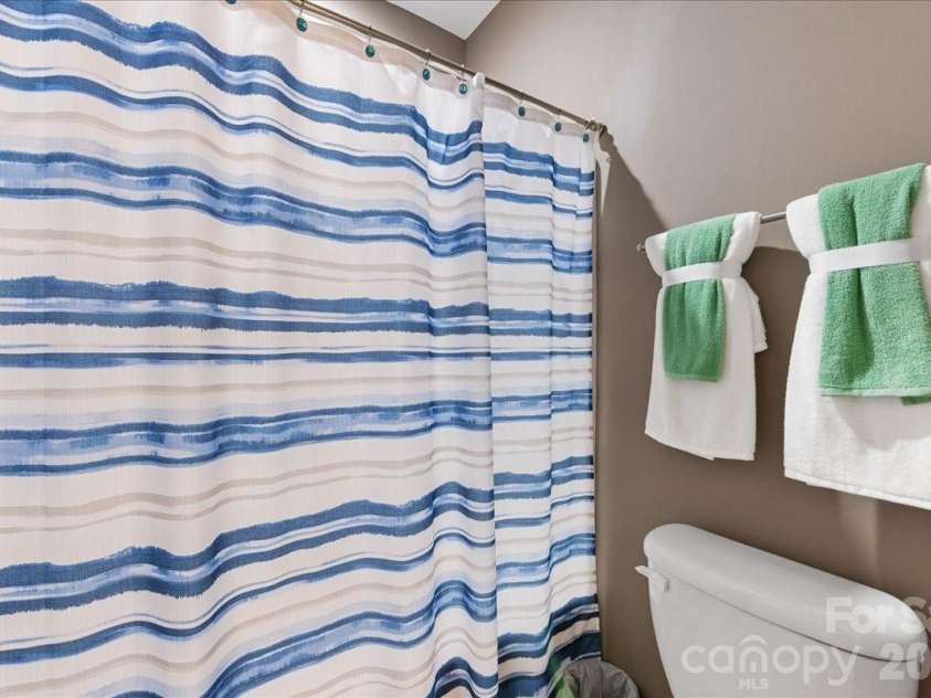 2511 Carnation Drive, Harrisburg, NC 28075.  MLS# CAR4345682, YatesRealty ID 3956. Guest bathroom