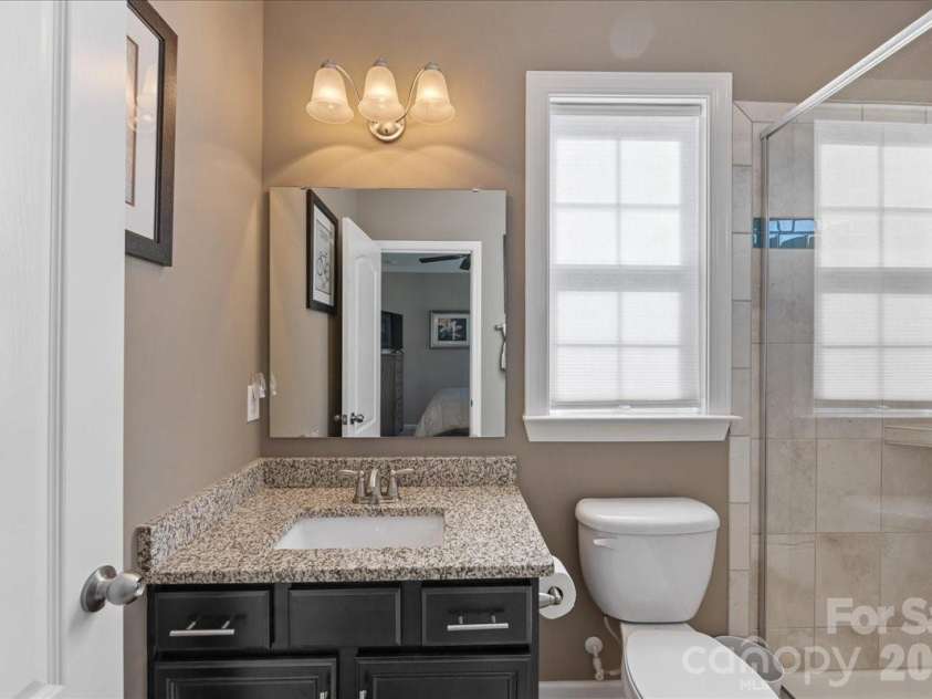 2511 Carnation Drive, Harrisburg, NC 28075.  MLS# CAR4345682, YatesRealty ID 3956. Main level bathroom