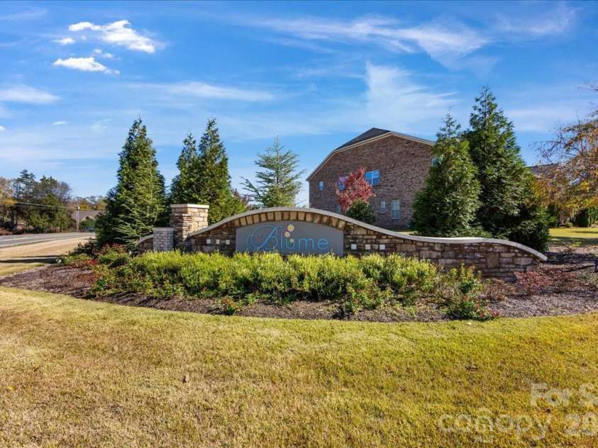 2511 Carnation Drive, Harrisburg, NC 28075.  MLS# CAR4345682, YatesRealty ID 3956. Subdivision entrance