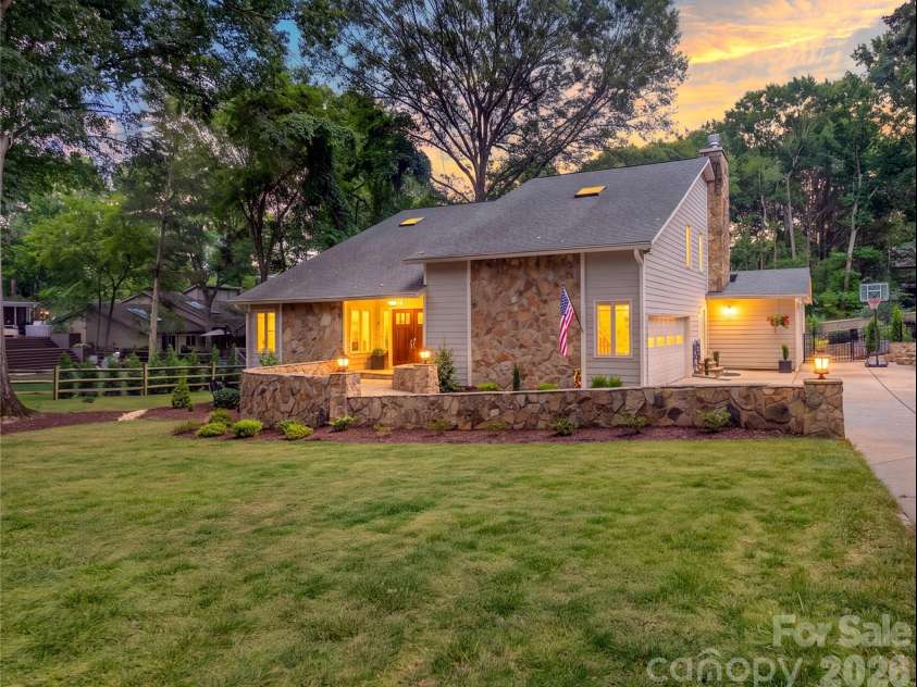 3011 Lauren Glen Road, Charlotte, NC 28226.  MLS# CAR4406881, YatesRealty ID 39562. Twilight Front