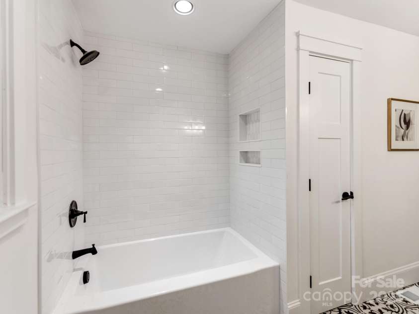 3608 Table Rock Road, Charlotte, NC 28226.  MLS# CAR4238799, YatesRealty ID 3957. Linen Closet and Tub Shower Combo in Guest on Main