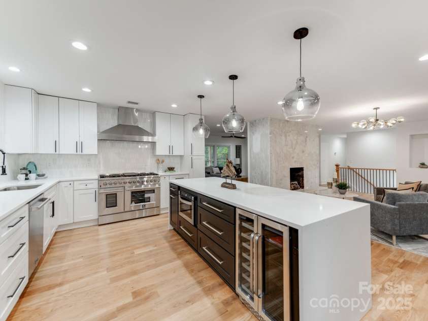 3608 Table Rock Road, Charlotte, NC 28226.  MLS# CAR4238799, YatesRealty ID 3957. Wine Cooler, Auto Opening Drawer Microwave, New Soft Close Solid Wood Cabinets and Knurled Hardware