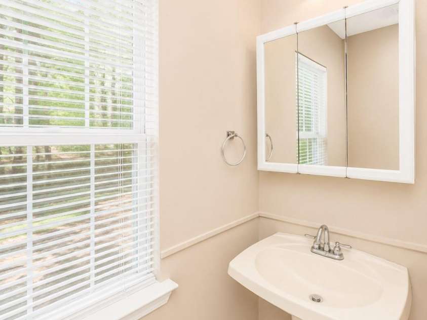6417 Spanish Moss Lane, Charlotte, NC 28262.  MLS# CAR4407084, YatesRealty ID 39570. Half Bath