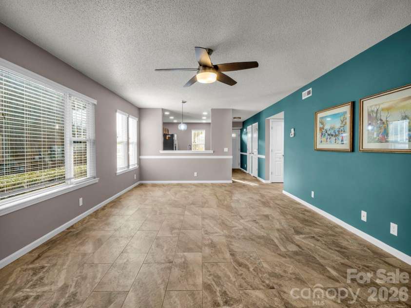 1505 Deermouse Way, Hendersonville, NC 28792.  MLS# CAR4330344, YatesRealty ID 3958. Living Room Facing Kitchen