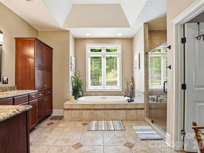 291 Patternote Road, Mooresville, NC 28117.  MLS# CAR4405697, YatesRealty ID 39580. Lage primary bathroom