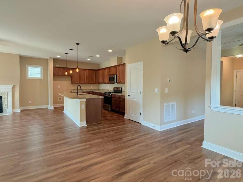 6281 Raven Rock Drive, Denver, NC 28037.  MLS# CAR4401364, YatesRealty ID 39588. Dining room looking to kitchen
