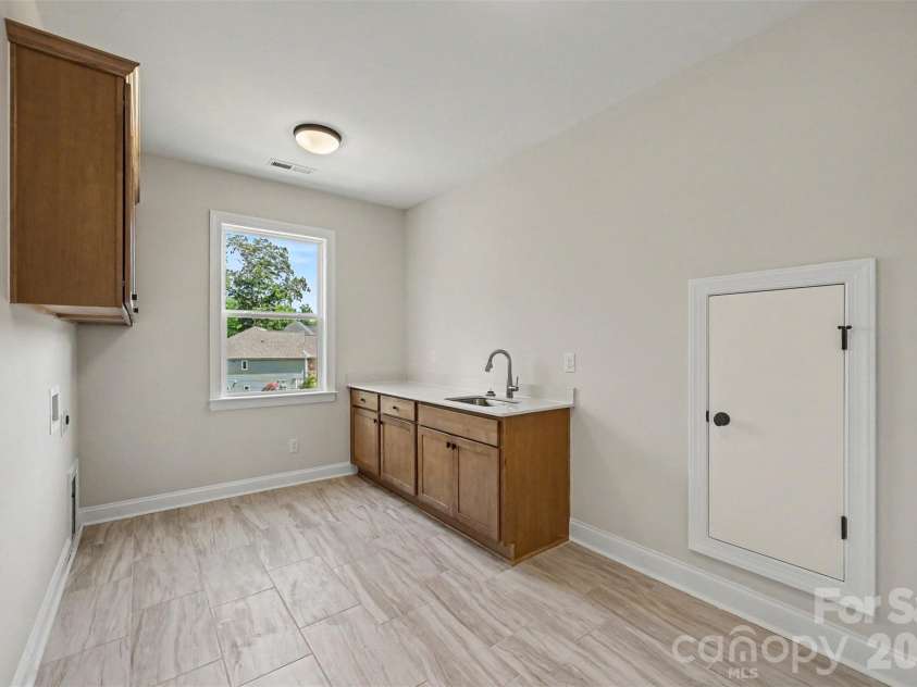 4021 Harmattan Drive, Denver, NC 28037.  MLS# CAR4406004, YatesRealty ID 39589. Second Floor Laundry Room