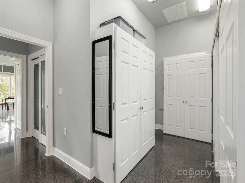 161 Birchwood Drive, Hendersonville, NC 28739.  MLS# CAR4309211, YatesRealty ID 396. Dressing Room Area with Hall of Closets