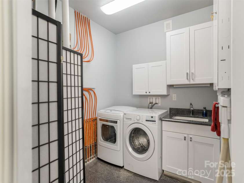 161 Birchwood Drive, Hendersonville, NC 28739.  MLS# CAR4309211, YatesRealty ID 396. Laundry Room with LG Washer and Dryer