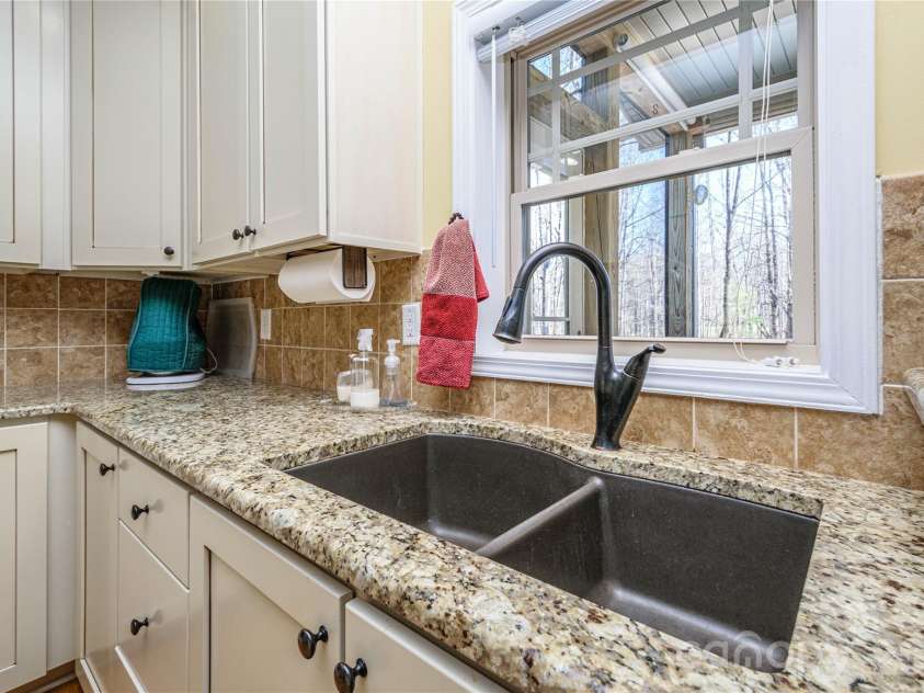 281 Ewbank Road, Etowah, NC 28729.  MLS# CAR4342497, YatesRealty ID 3960. 