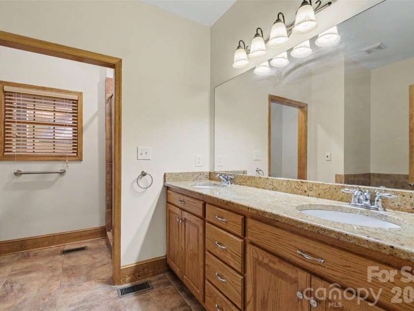 121 Mossy Rock Trail, Iron Station, NC 28080.  MLS# CAR4399129, YatesRealty ID 39601. Primary Bath