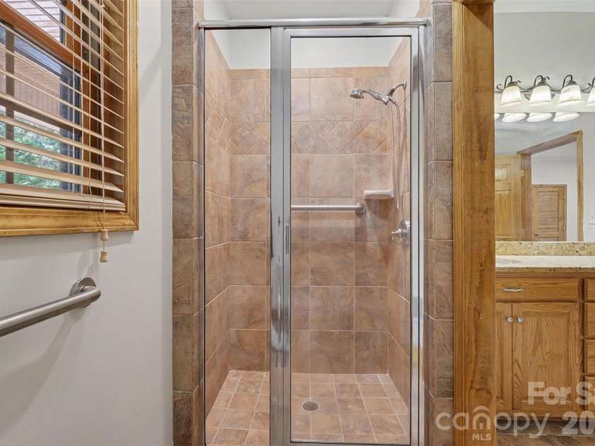 121 Mossy Rock Trail, Iron Station, NC 28080.  MLS# CAR4399129, YatesRealty ID 39601. Primary Bath Shower